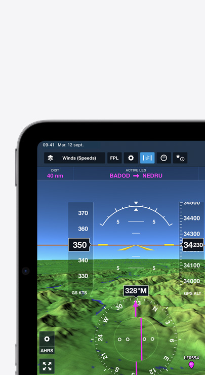 Un iPad affiche la vitesse et la direction du vent sur une carte topographique avec des reliefs représentant des montagnes.