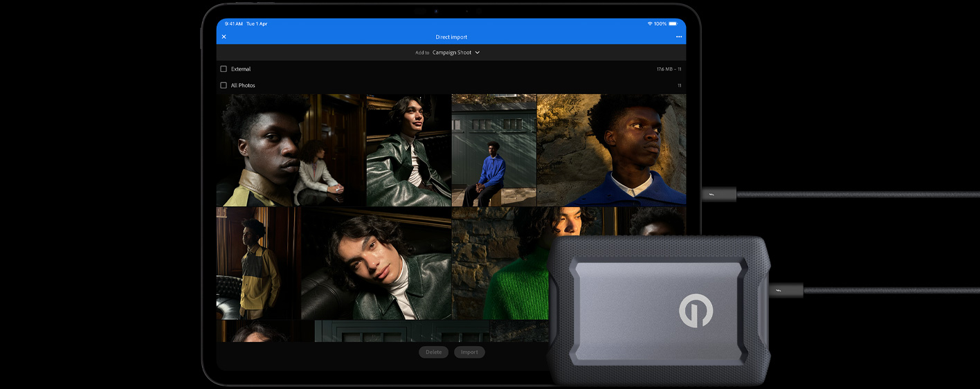 iPad Pro, front exterior, landscape orientation, space black color, connected with a cable to a USB-C external hard drive, display showing photos of models being imported to a folder called 'Campaign Shoot'