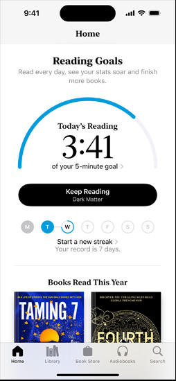 iPhone screen showing the Reading Goals interface in the Books app. At the top, there is a progress ring. Below the progress ring is the weekly reading streaktracker. At the bottom is the Books Read This Year section, which includes a row of two books, with an empty slot for a third