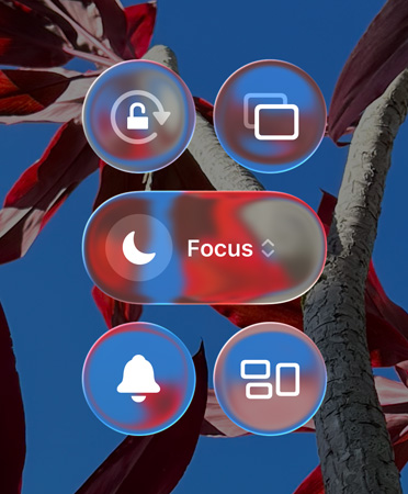 Colorful iPhone home screen with transparent Liquid Glass apps and widgets
