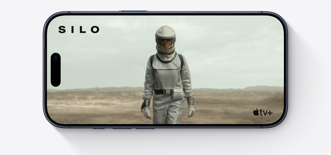 iPhone front exterior, horizontal, Apple TV clip of person in spacesuit, Silo